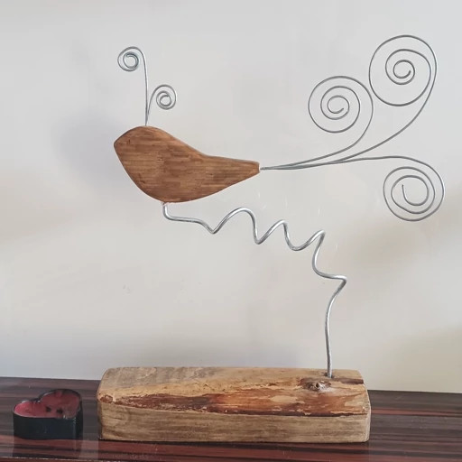 مجسمه چوبی پرنده زینتی آقای نجار
